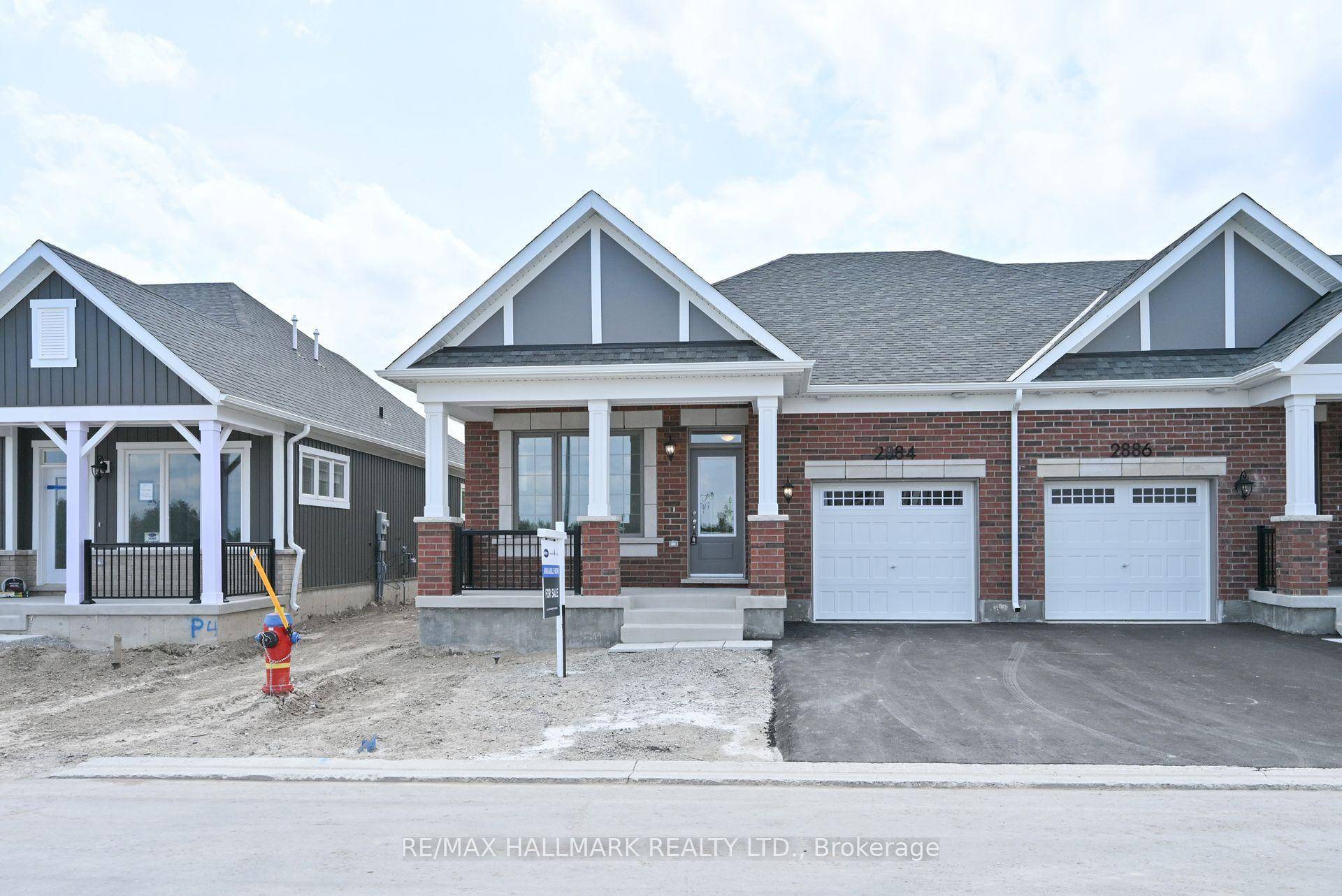 Brand new end unit spacious land lease bungalow with extra windows amp ; premium upgrades !