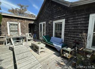 Charming one bedroom cottage, vaulted ceiling, bright sunny deck and guest studio with half bath.