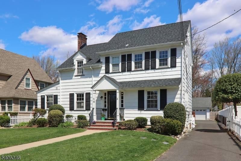 Classic circa 1927 Center Hall Colonial offering 9 rooms, 4 5 BR's one used as office study, 2 baths.
