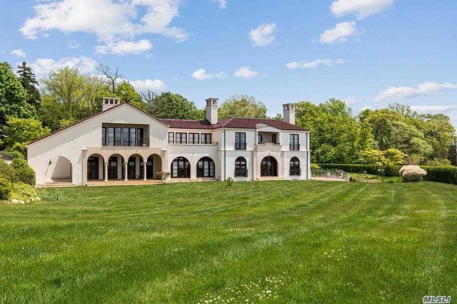 Four andhalf acre Estate with second 2 acres a separate building lot.