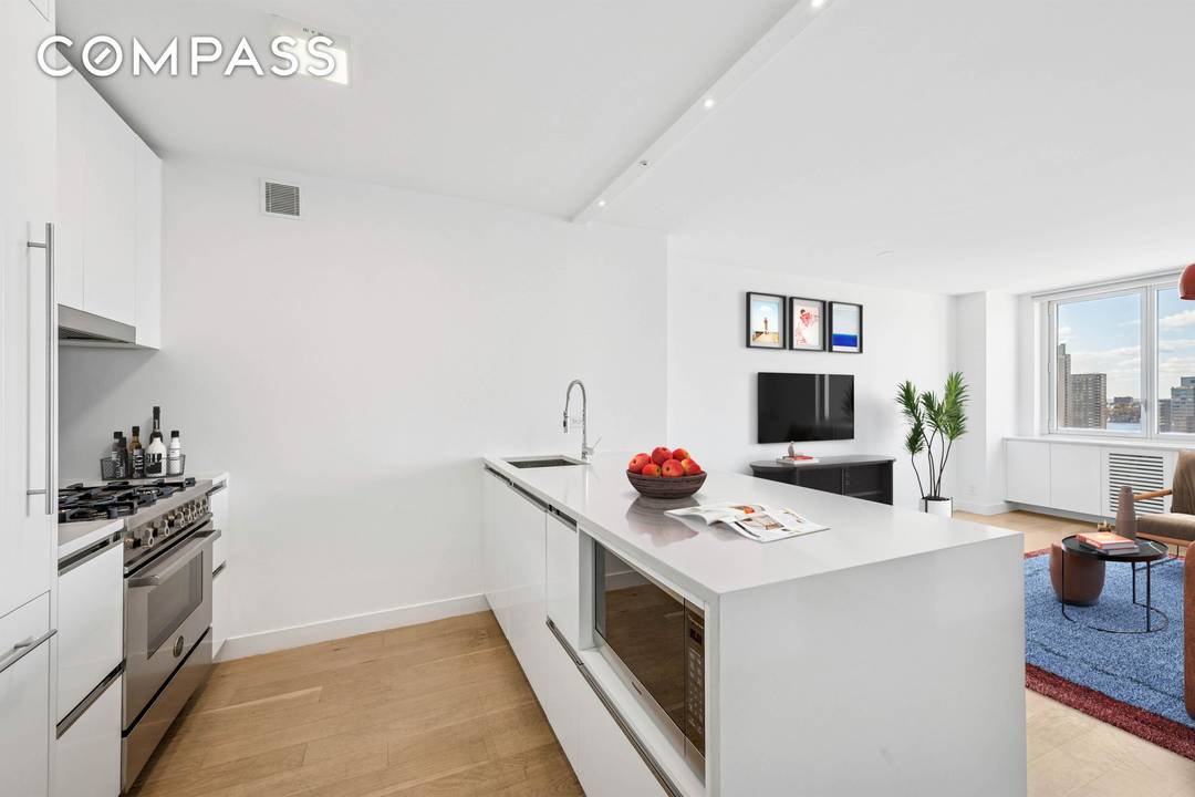 Spectacular high floor, west facing views await you in this spacious 2 bedroom, 1 bath residence at 301 West 53rd Street, perfectly located in the heart of vibrant Hell s ...