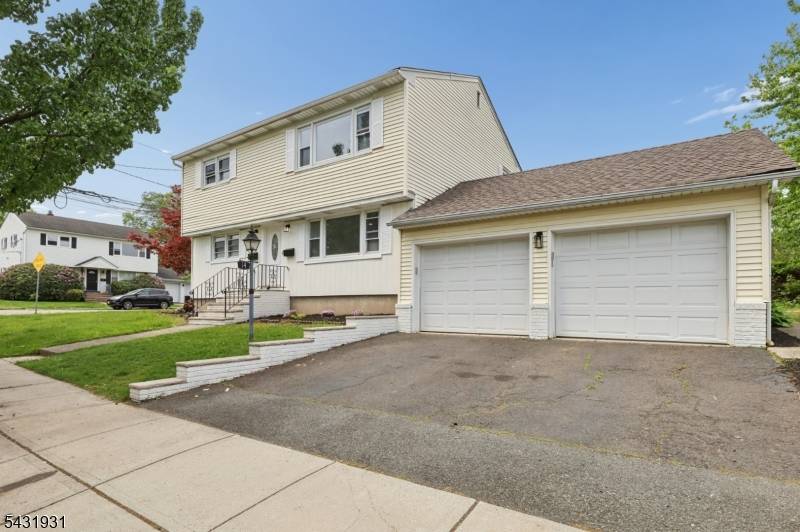 Rare opportunity to own a fully renovated two family home in the highly desirable Albion section of Clifton, just steps from the park.