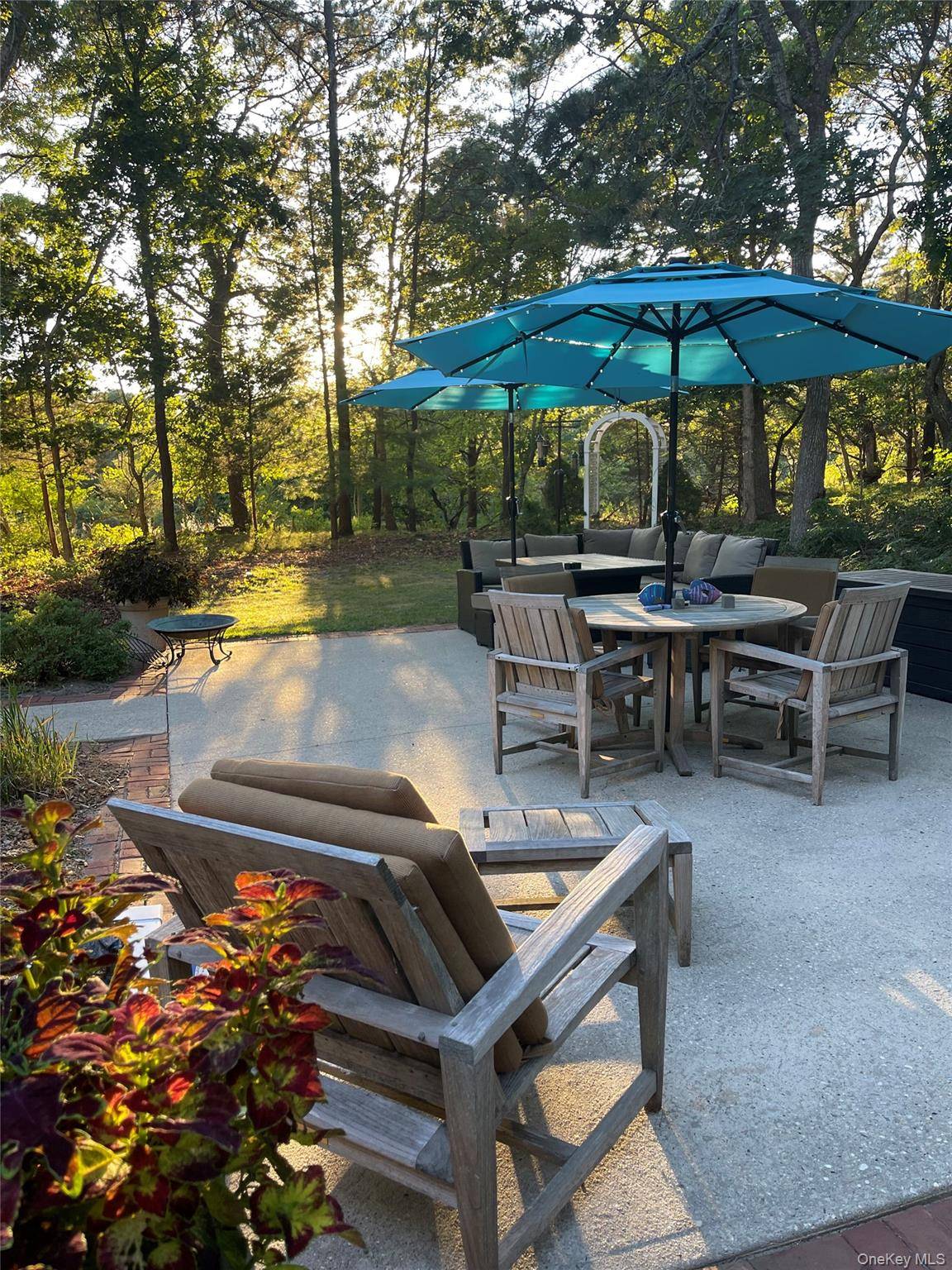 Discover the charm of Quiogue living at this inviting traditional home located at 20 Deborah Drive.