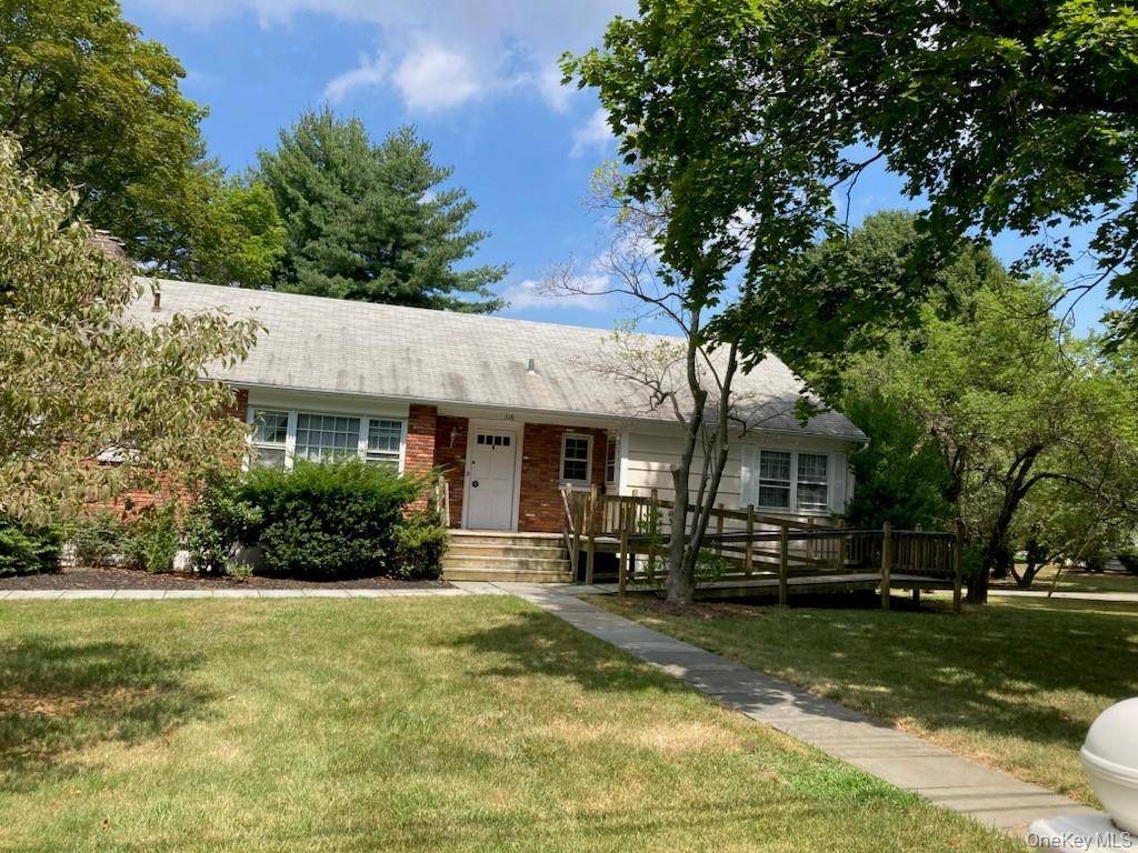 Easy living ranch home with ADA compliant ramp at entrance.
