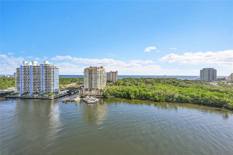 Price Improvement, 874, 000 This corner unit has incredible views of the Ocean, Intracostal, and the Bonnett estate.