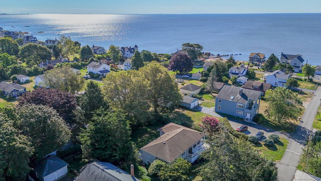 COME SEE THIS ONE OF KIND FULLY RENOVATED MADISON HOME WITH PRIVATE BEACH RIGHTS !