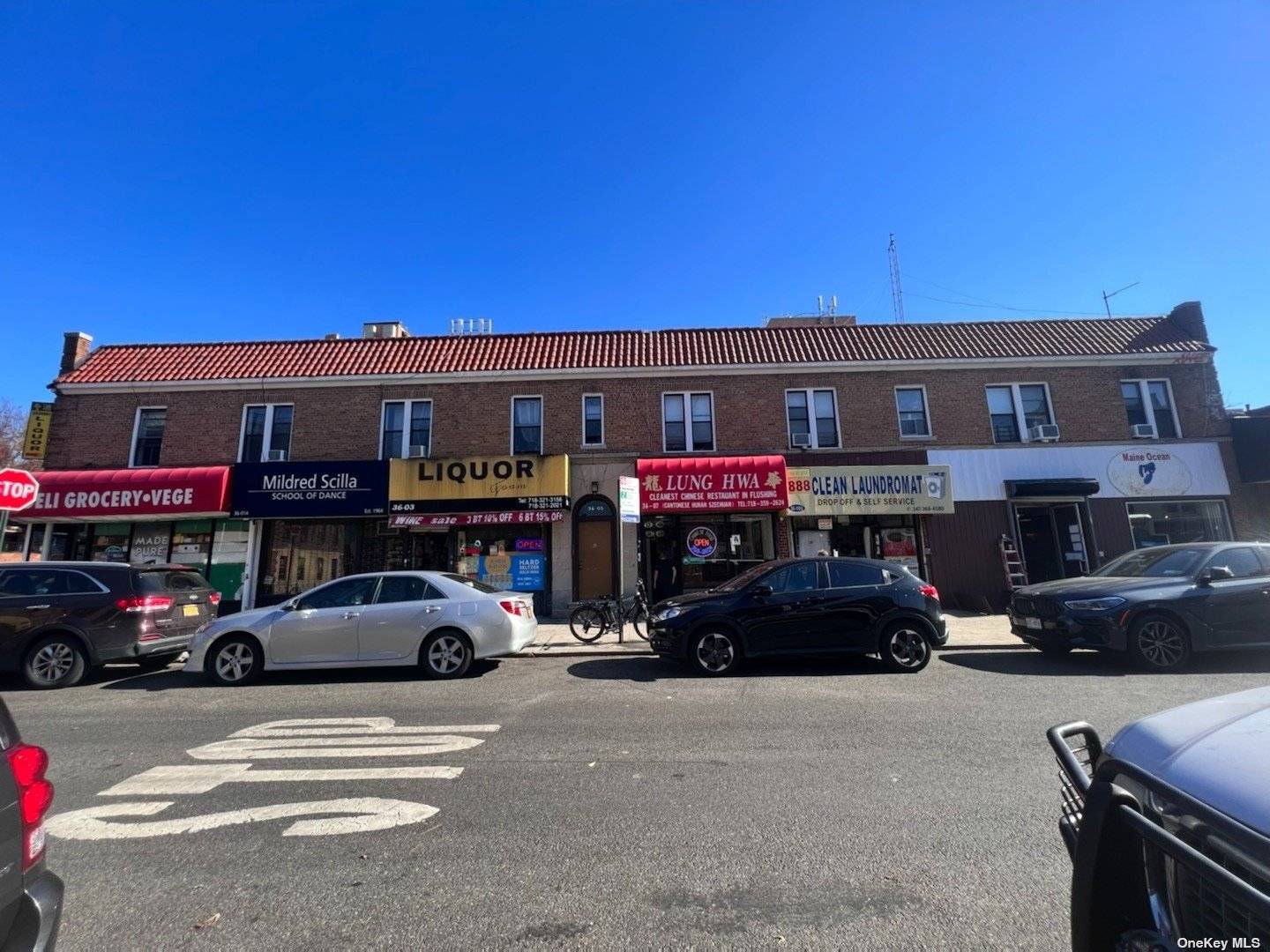 Flushing prime location, corner lot huge property, mixed use building, 9 stores 7 Residentails, 100 occupied, next to LIRR station, possible to extend, 5000 sqft FAR.