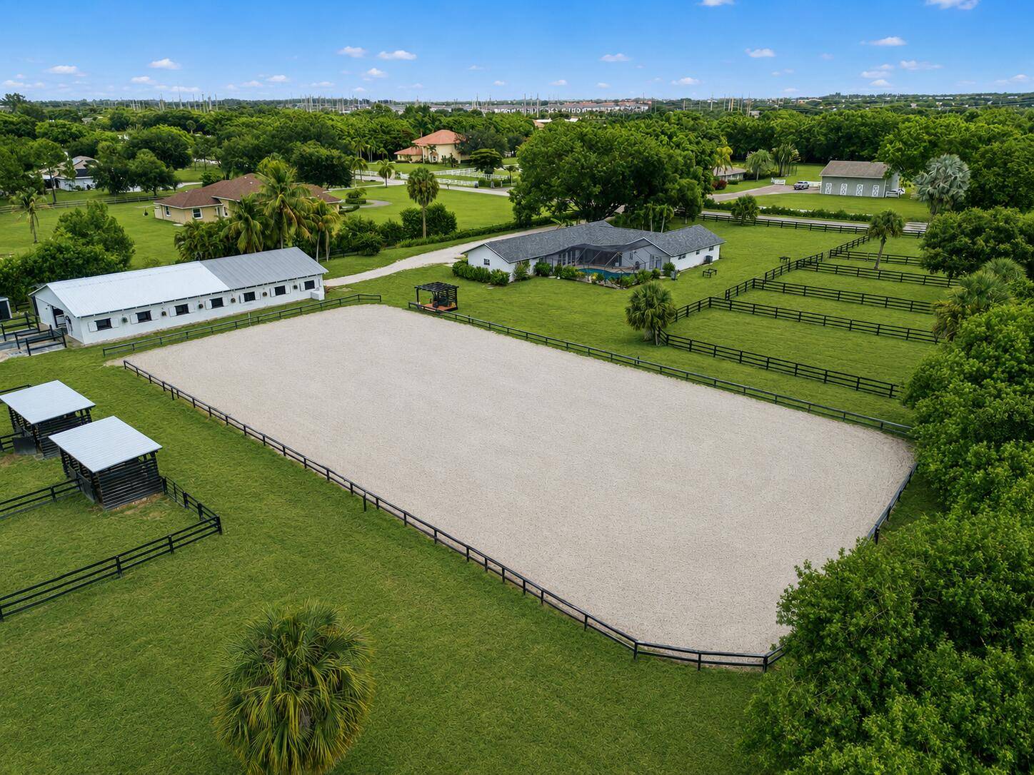 Experience the ultimate Wellington equestrian lifestyle in the highly sought after Little Ranches community.