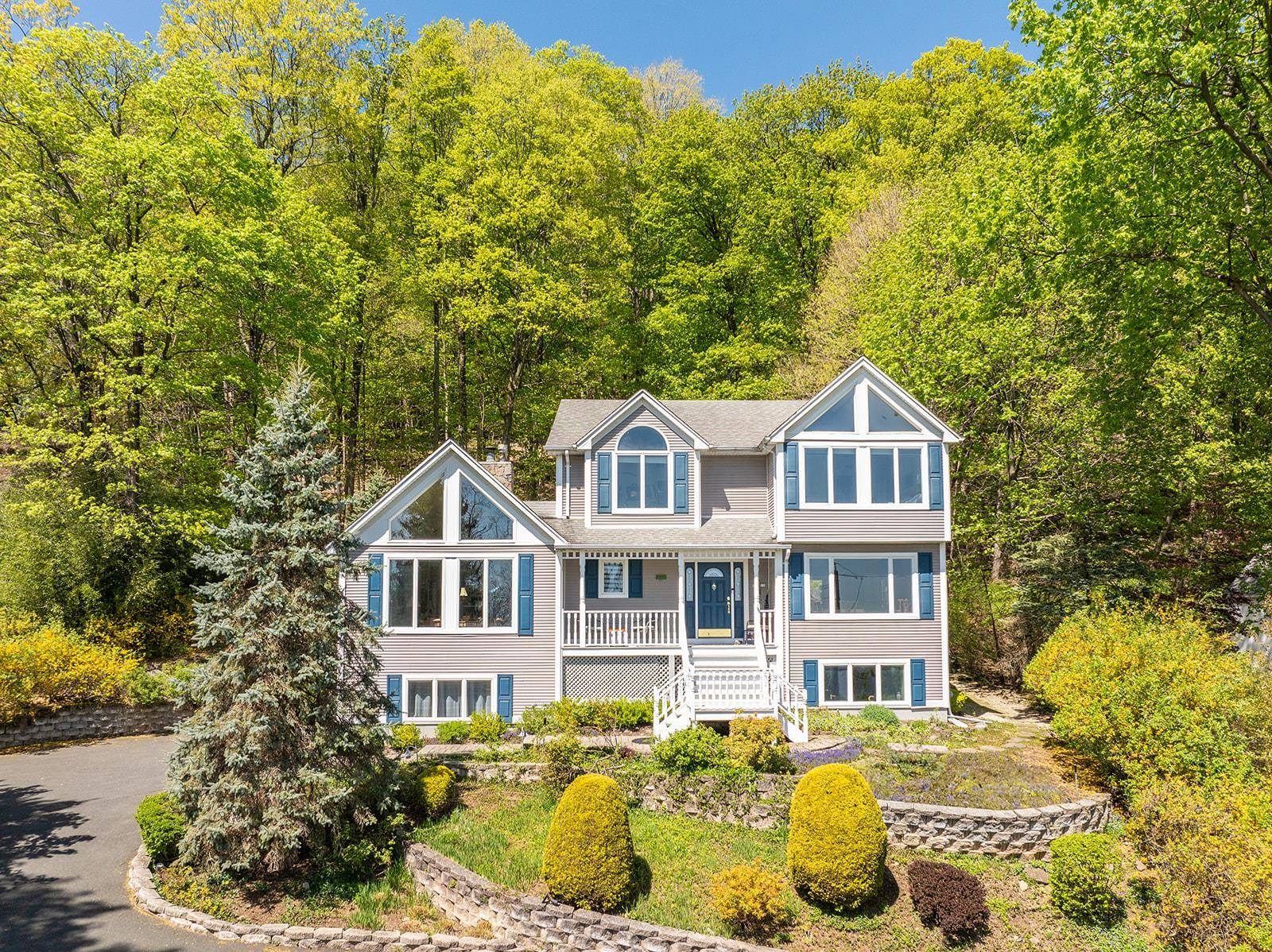 Welcome to the best of Village living in this spacious, Victorian style colonial home with breathtaking, four season Hudson River and Cuomo Bridge views set on 2.