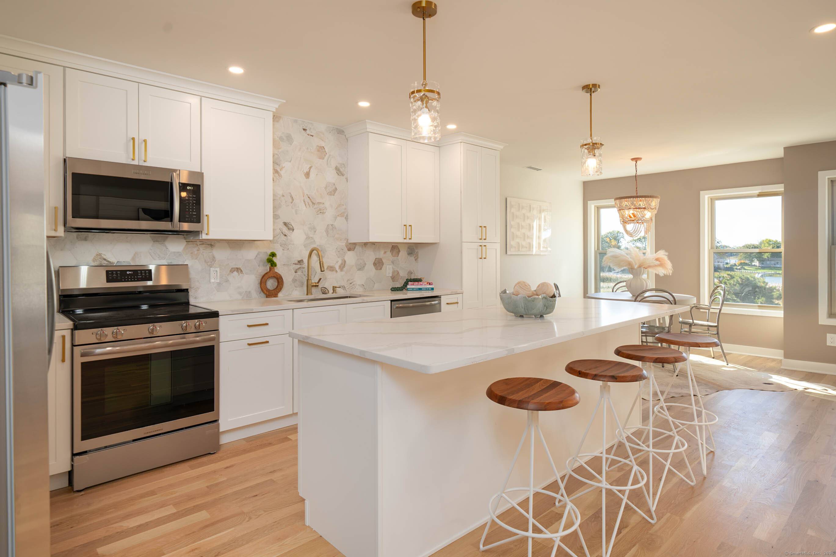 Luxurious 2 Bedroom, 2. 1 bathroom end unit condo in the Sylvan Point complex spans 1, 818 square feet of meticulously renovated water view living space.