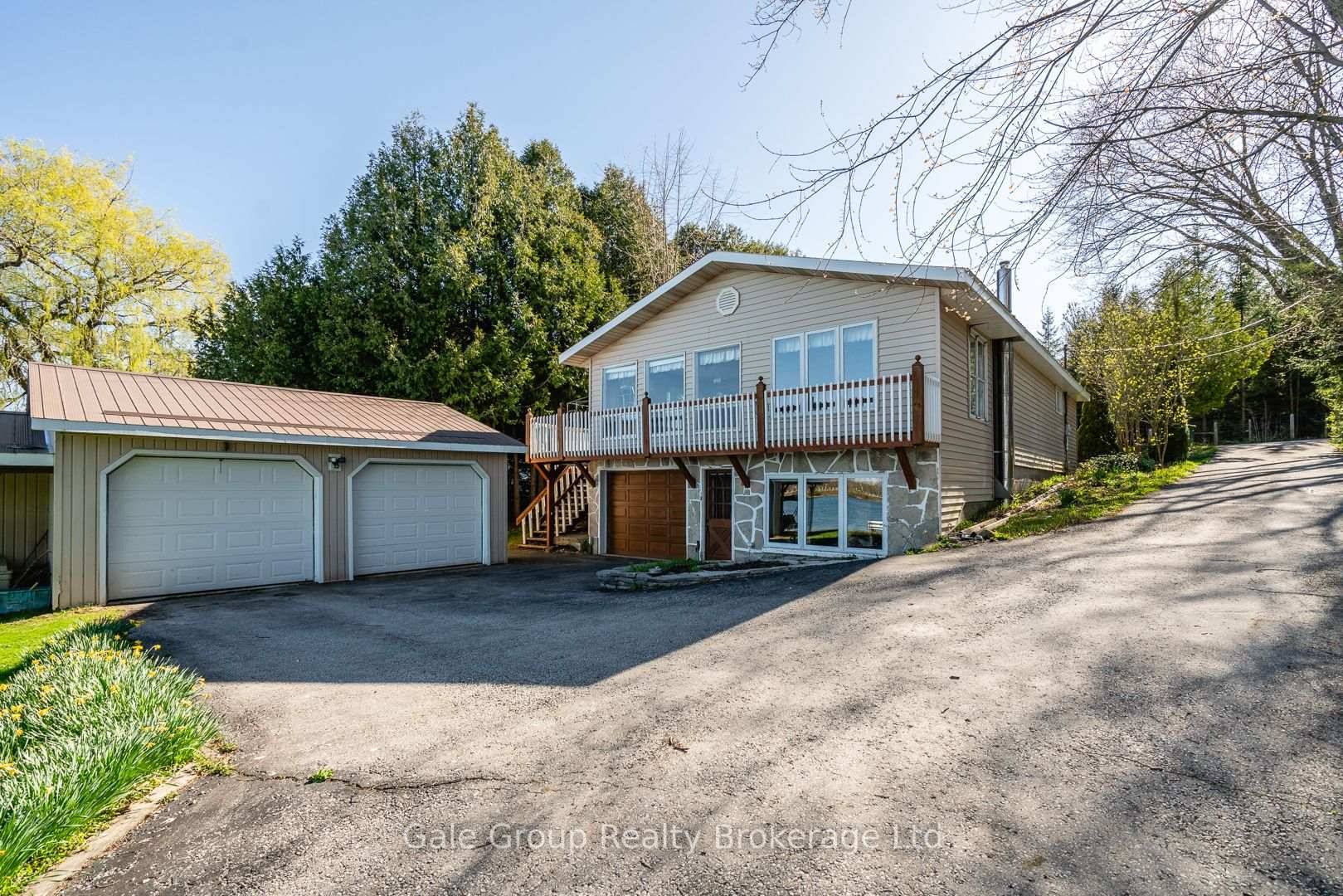 This charming 3 bedroom cottage, perfect as a year round home or weekend getaway, offers the ideal blend of comfort, character, and coveted lakefront living.