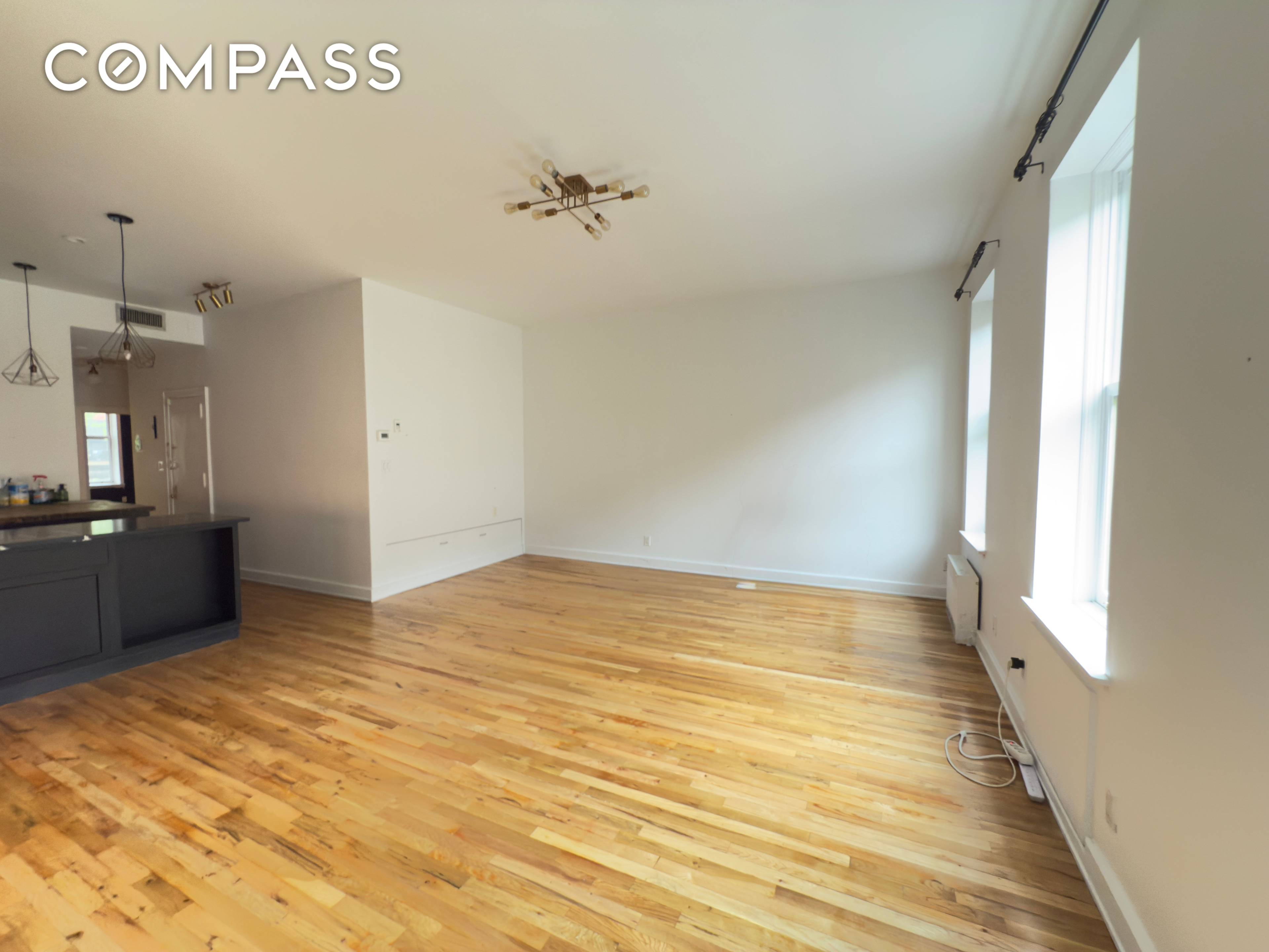 Wonderful Chelsea Floor through with 10 foot ceilings, two wood burning fireplace and a washer dryer !