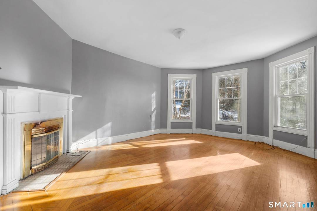 Spacious Victorian multifamily offering large units with classic architectural charm and strong rental appeal.