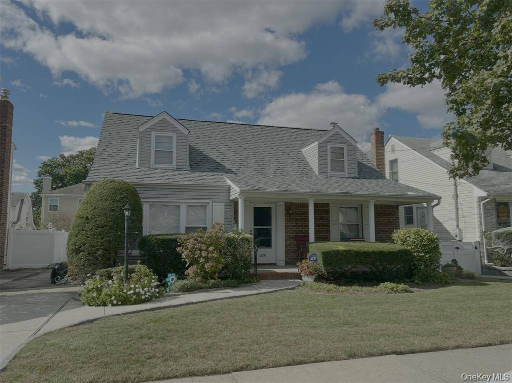 Lovely 4 Bedroom, 2 Bath Wide Line Cape with Great Bones and Terrific Curb Appeal Welcome to this charming and well maintained home ideally situated mid block.
