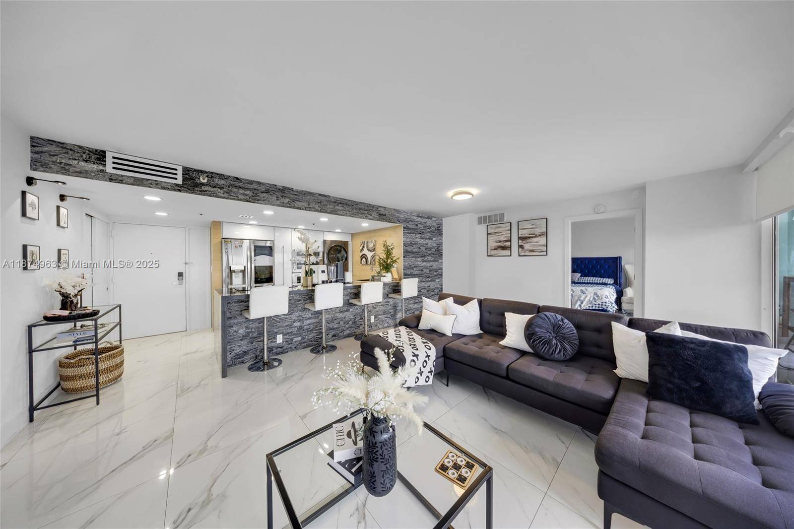 Step into luxury with this beautifully remodeled 2BR 2BA condo on the 14th floor of the prestigious Grand View Palace.