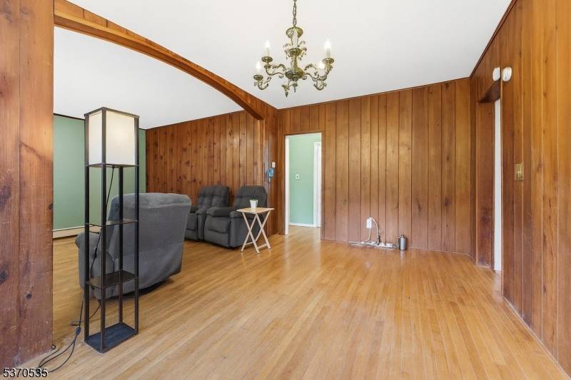 Welcome to 101 Seminole Ave a charming expanded ranch offering a spacious and versatile layout perfect for comfortable living.