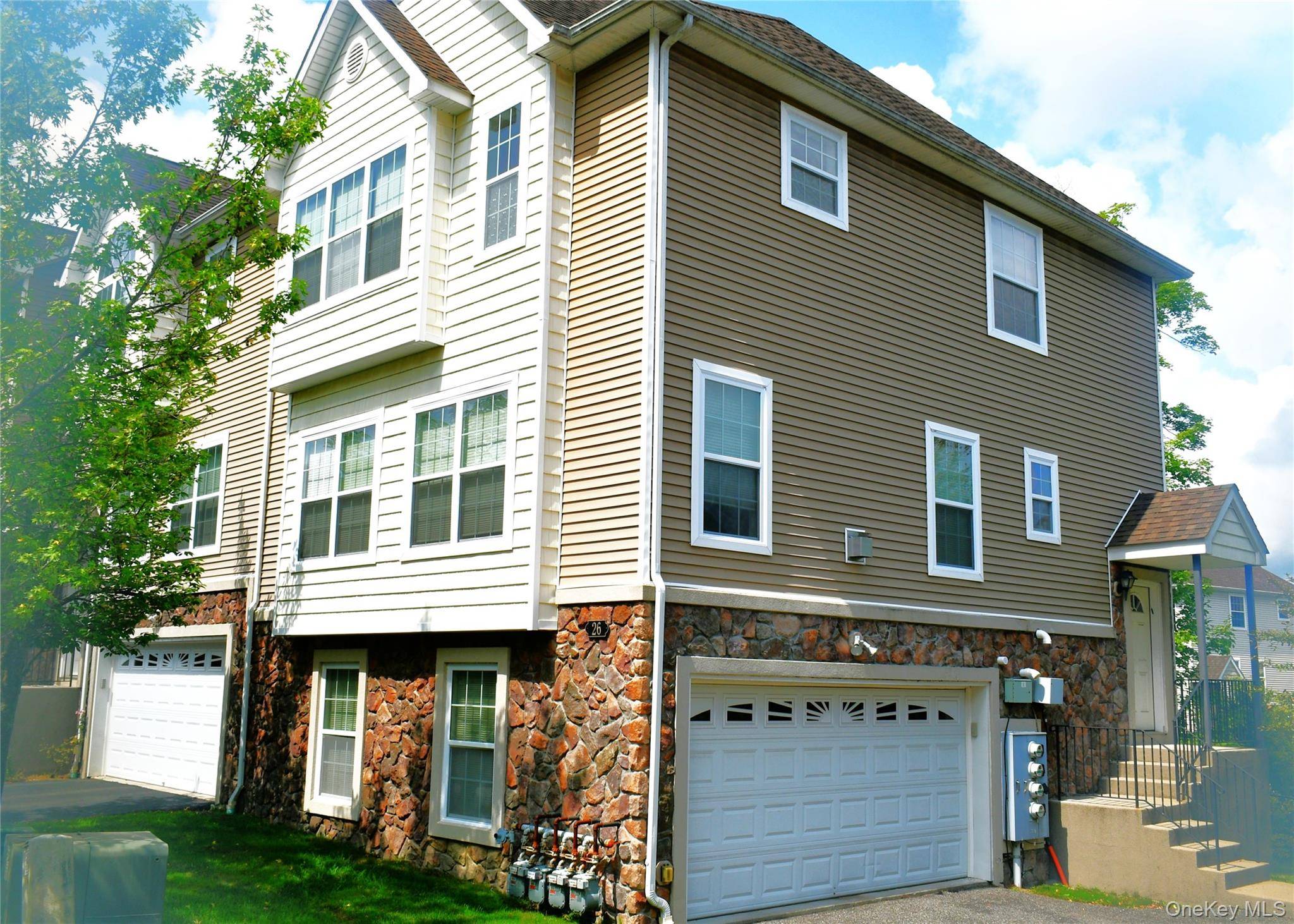 Discover your new home in this immaculate 2 bedroom, 2 full and 1 half bath end unit townhome, ideally located for privacy yet nearby community amenities.