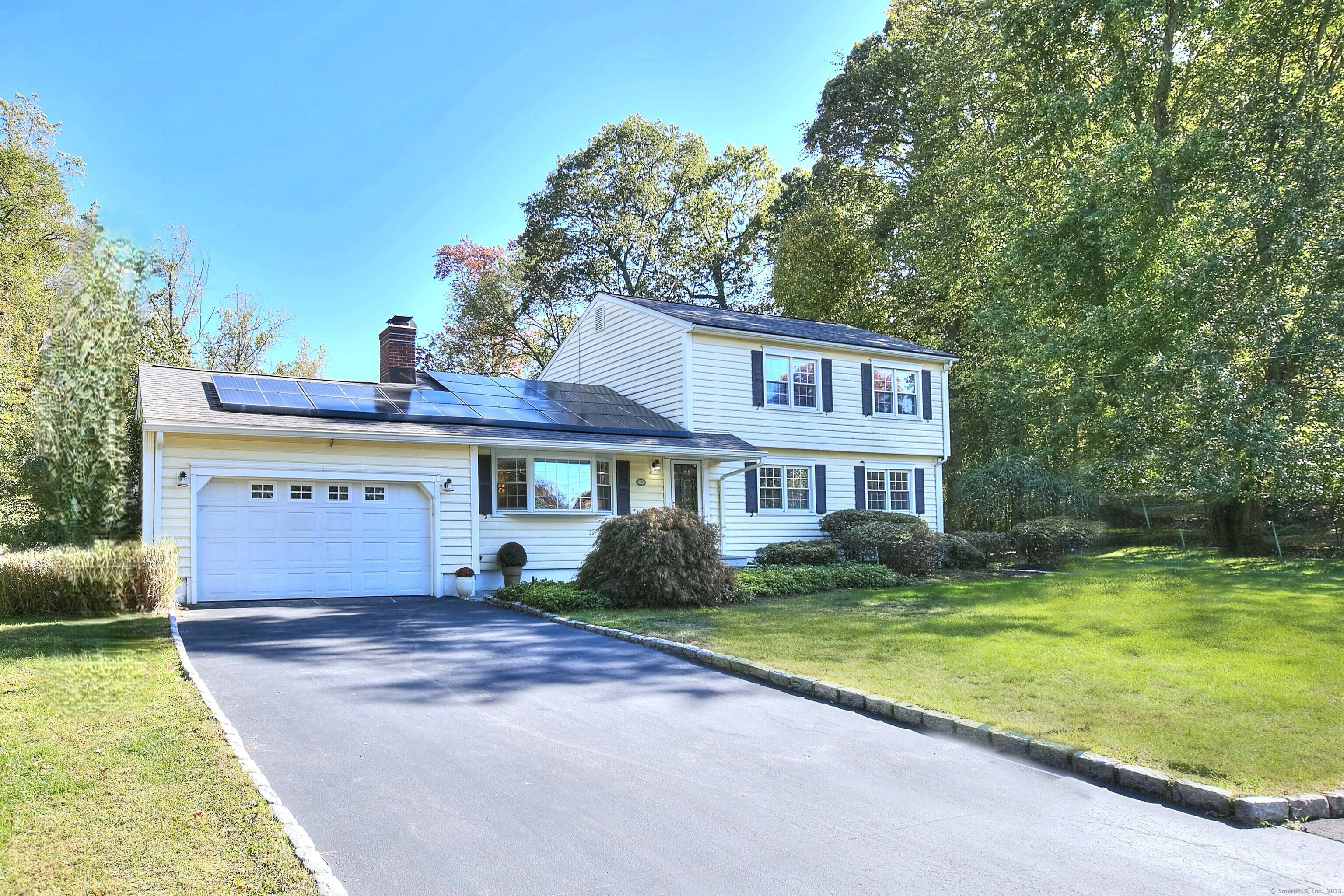 Envision your next chapter at 19 Woodchuck Court, a beautifully maintained Colonial at the end of a quiet cul de sac in Norwalk's desirable Flax Hill neighborhood.