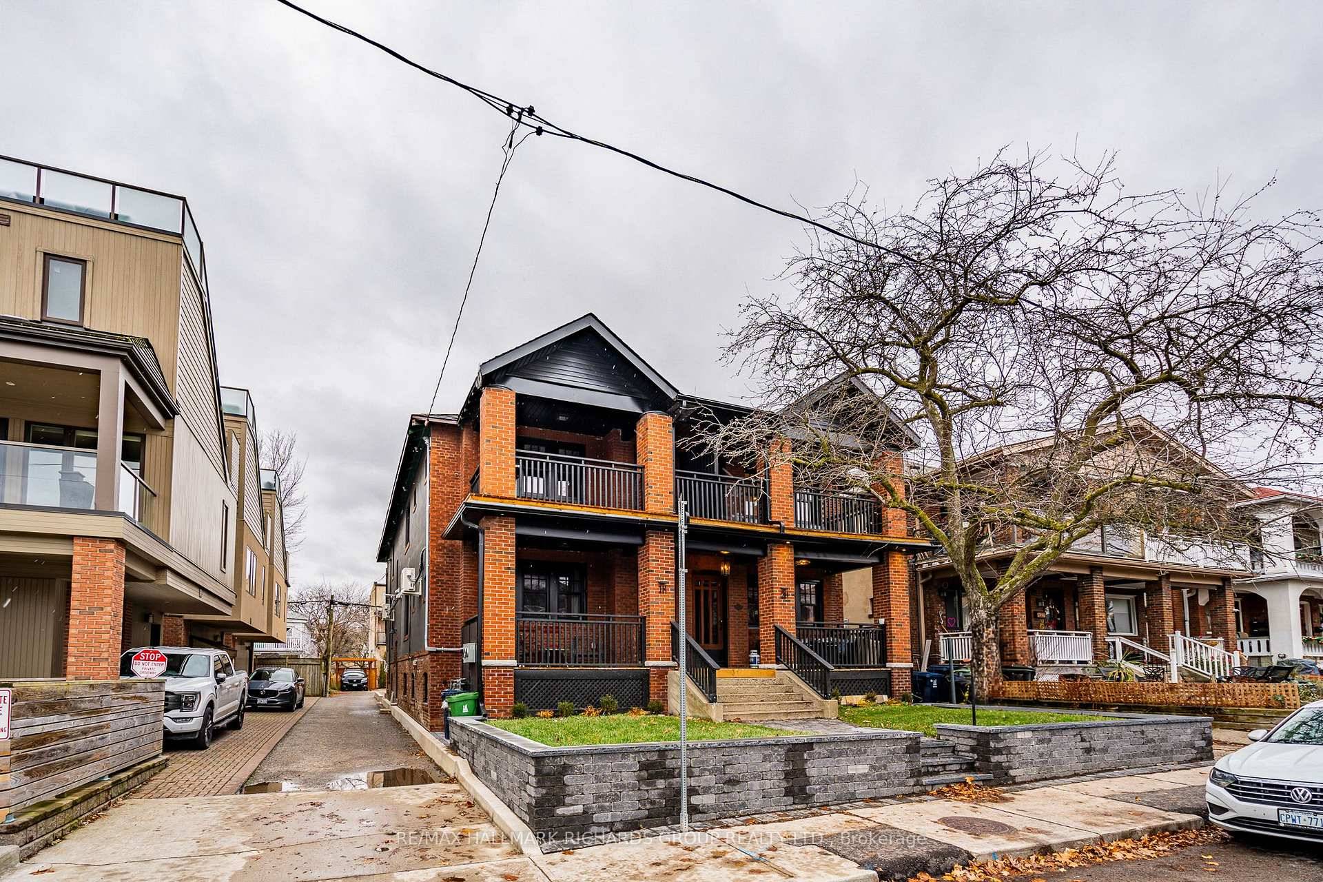 This Exquisitely Renovated upper level unit with soaring high ceilings, just steps from the beach !