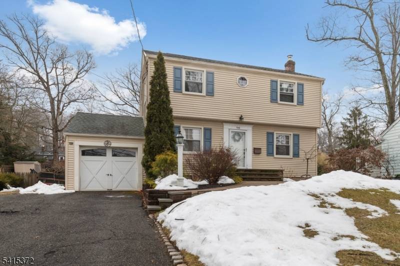 This pristine 3 bedroom 2 bath Colonial blends timeless charm with modern sophistication.