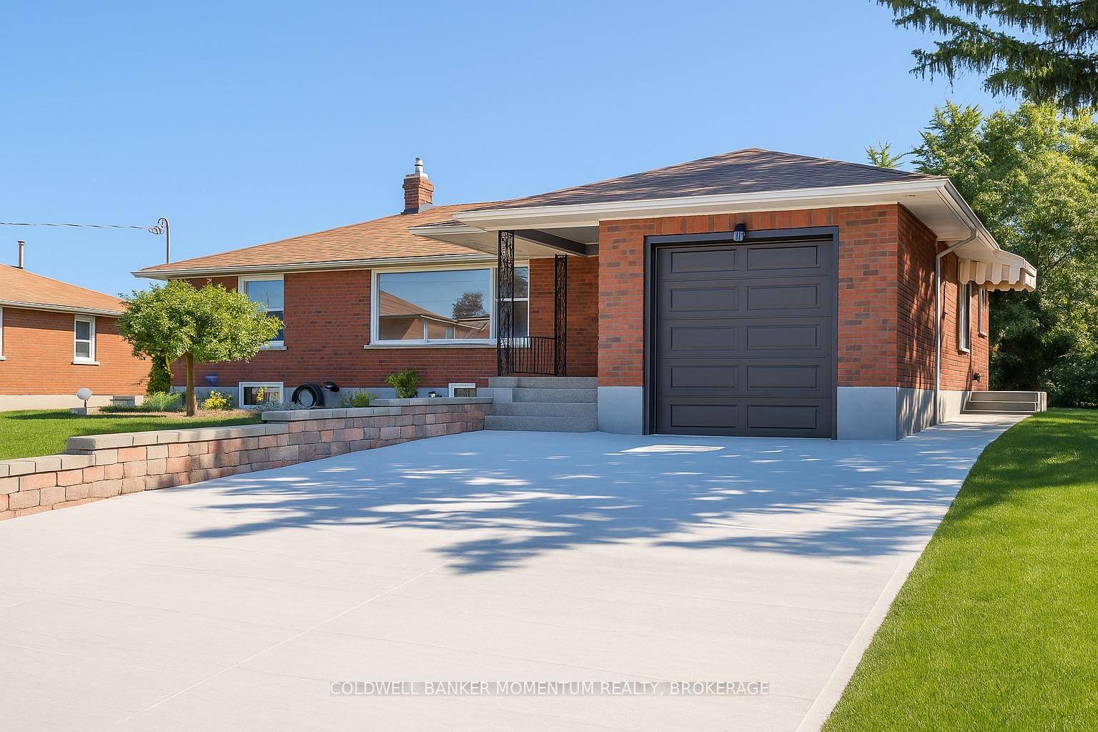 Check out this maintenance free brick bungalow home with an attached garage 21ft x 11ft, newly poured concrete driveway and large size irregular lot !
