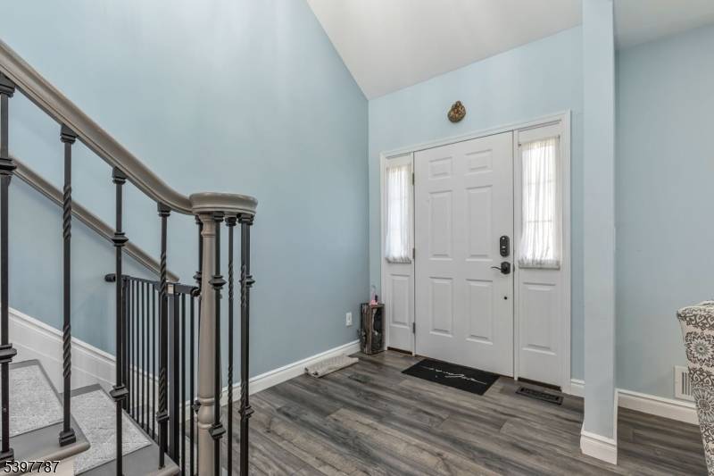 Welcome to this elegant Colonial residence, where timeless charm meets modern comfort.