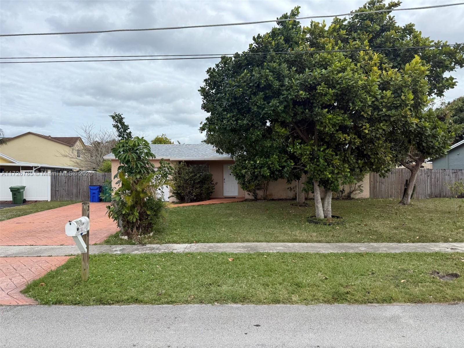 This charming home features 3 spacious bedrooms and 2 modern bathrooms, providing a comfortable living space for any family.