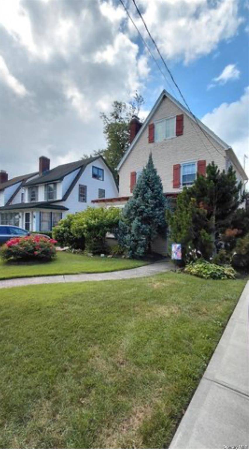 Welcome to 4172 Glenwood Street, a beautifully maintained and timeless Colonial nestled in the heart of Little Neck.