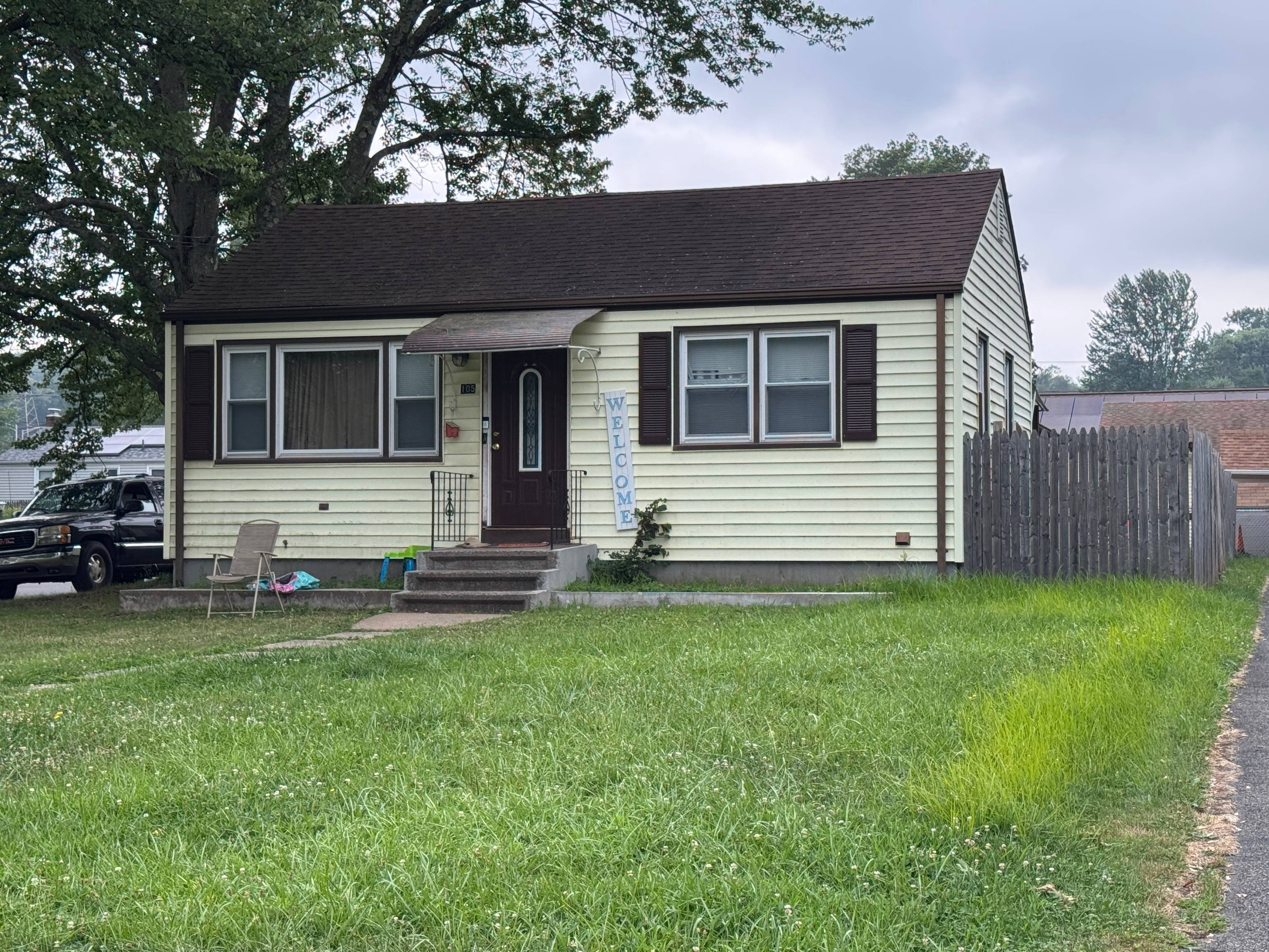 Ranch home featuring three bedrooms, partially finished basement, quiet neighborhood.