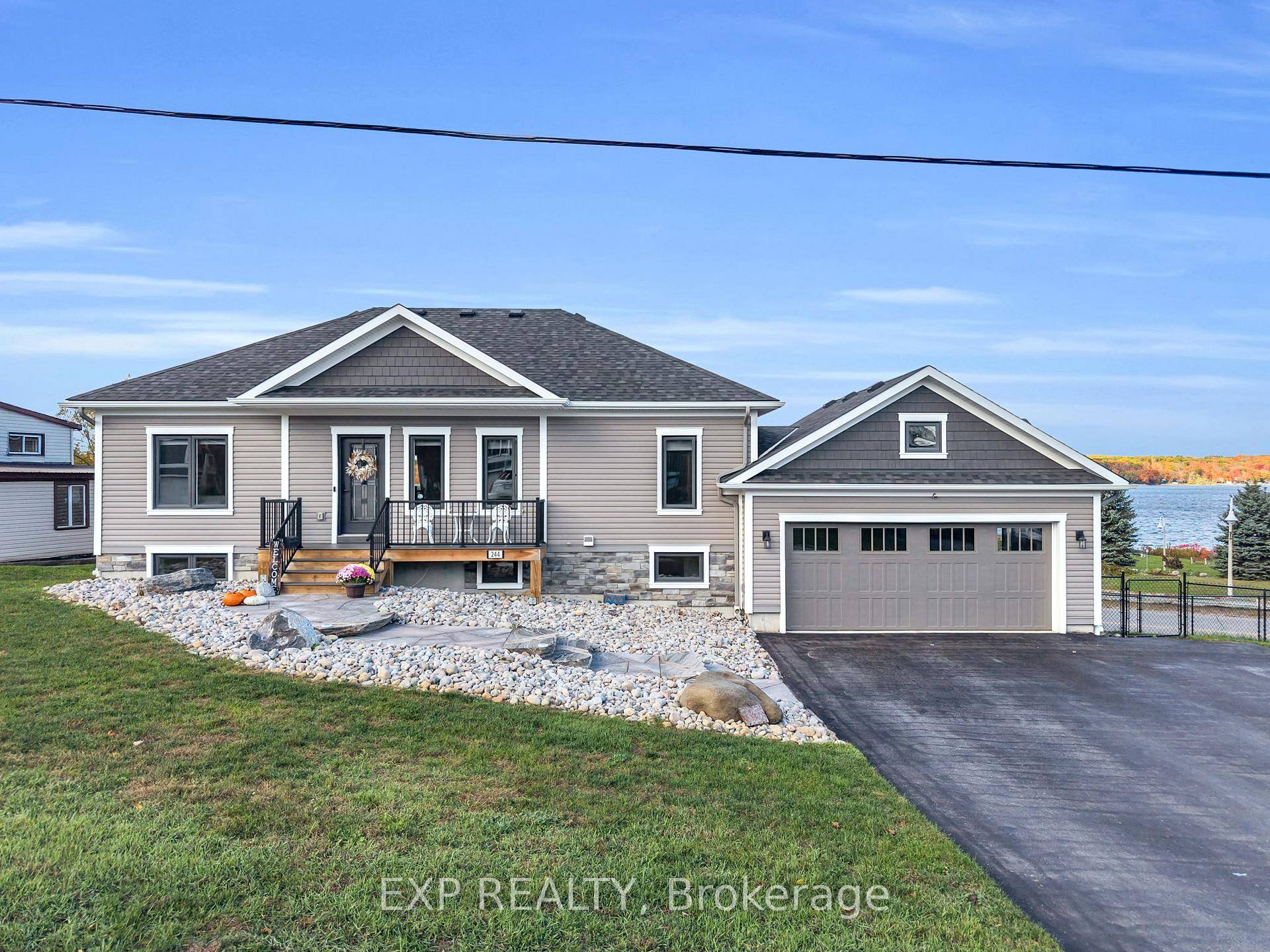 Welcome To 244 Frank Street, A Warm And Welcoming Home Where Panoramic Georgian Bay Views Wrap Every Room In A Cozy Glow.