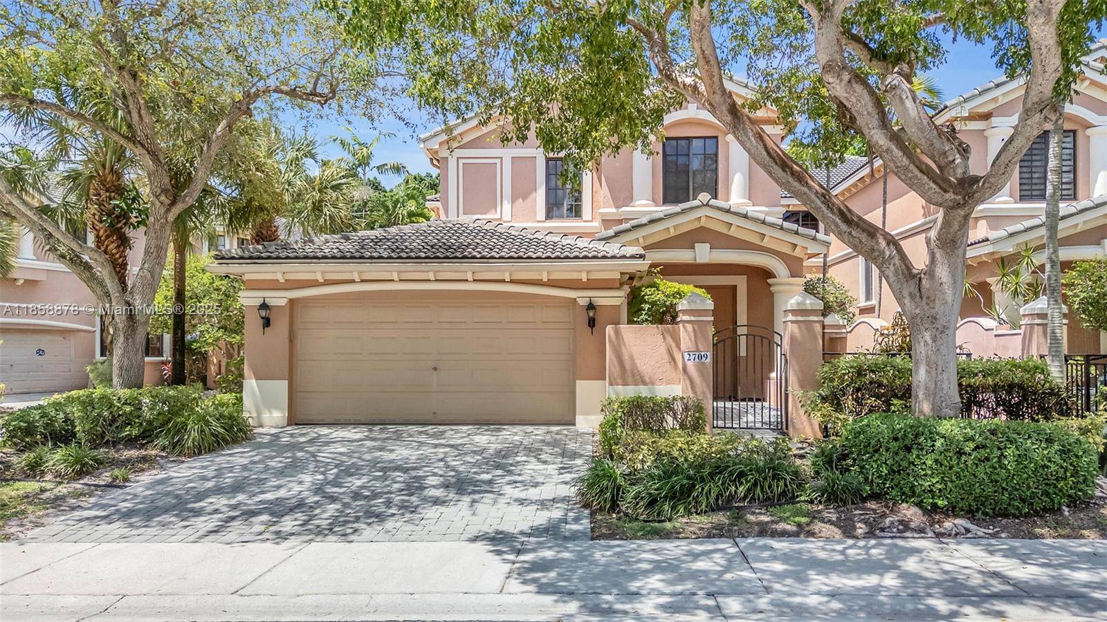 Spacious Coach Home with Golf Course Views in Weston Hills Country Club Discover this 4 bedroom, 2.