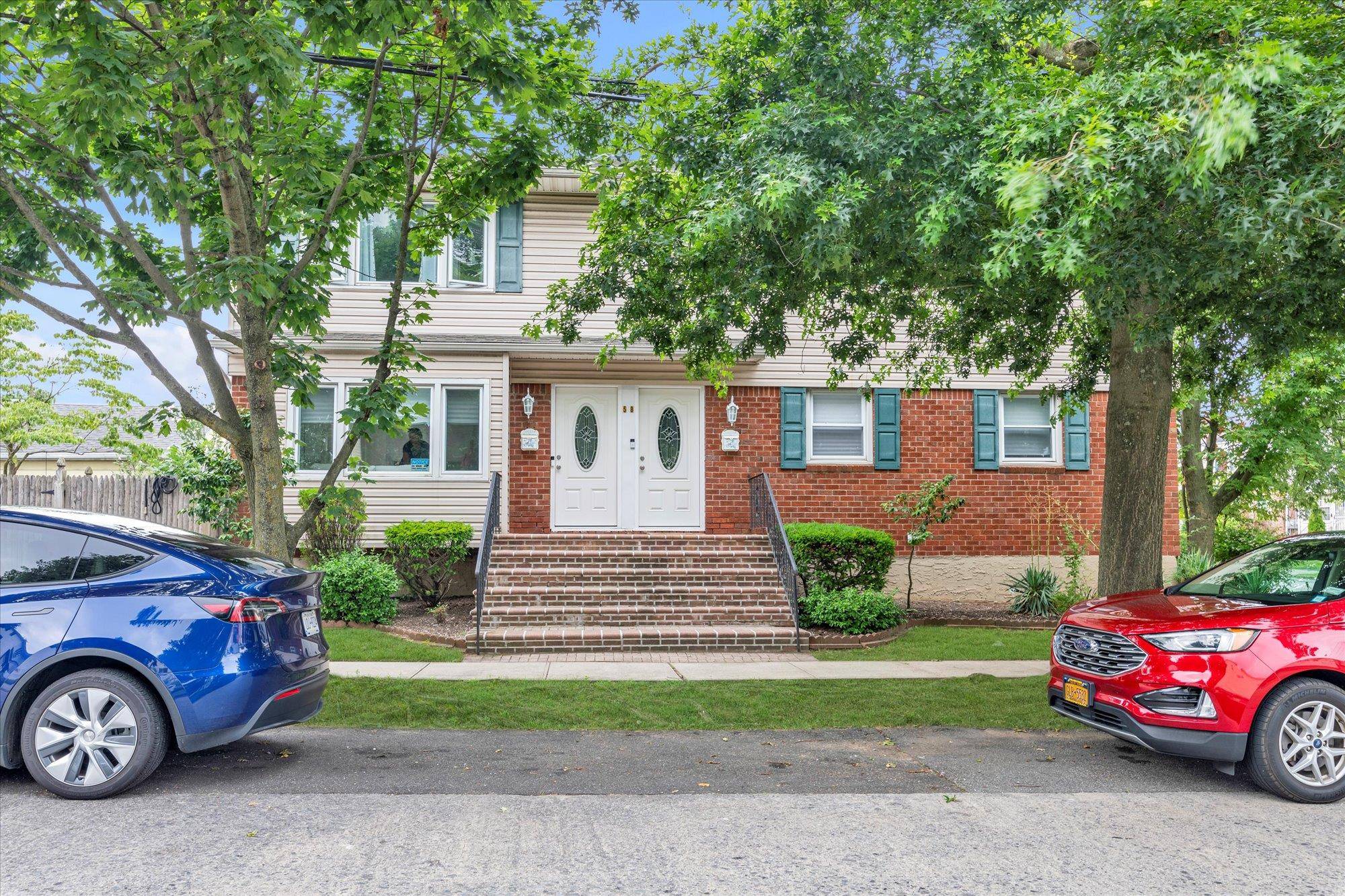 Charming Legal 2 Family Home Ideal for Investment or Multi Generational Living !