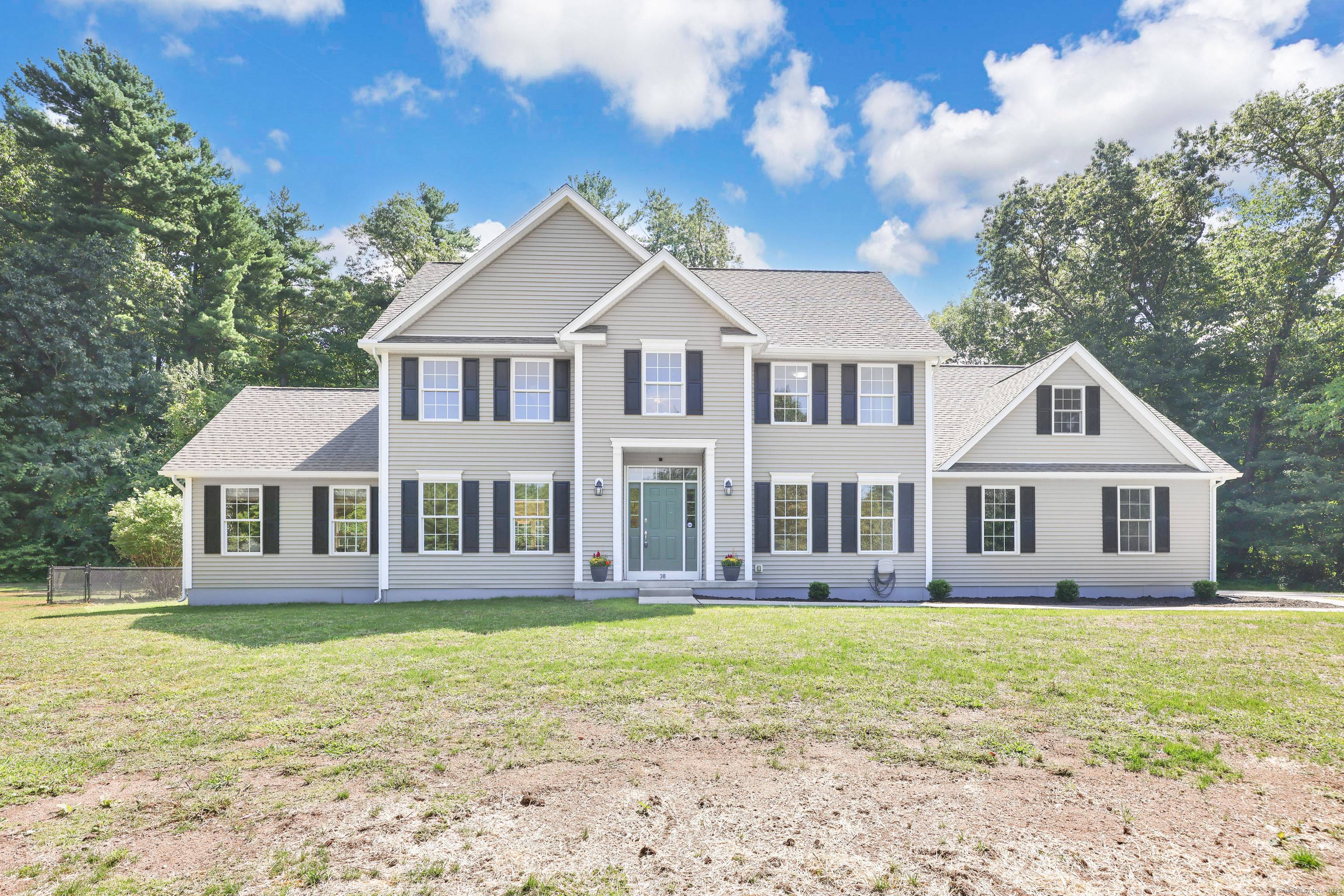 Discover this stunning Roulier built Colonial perfectly situated on 1.