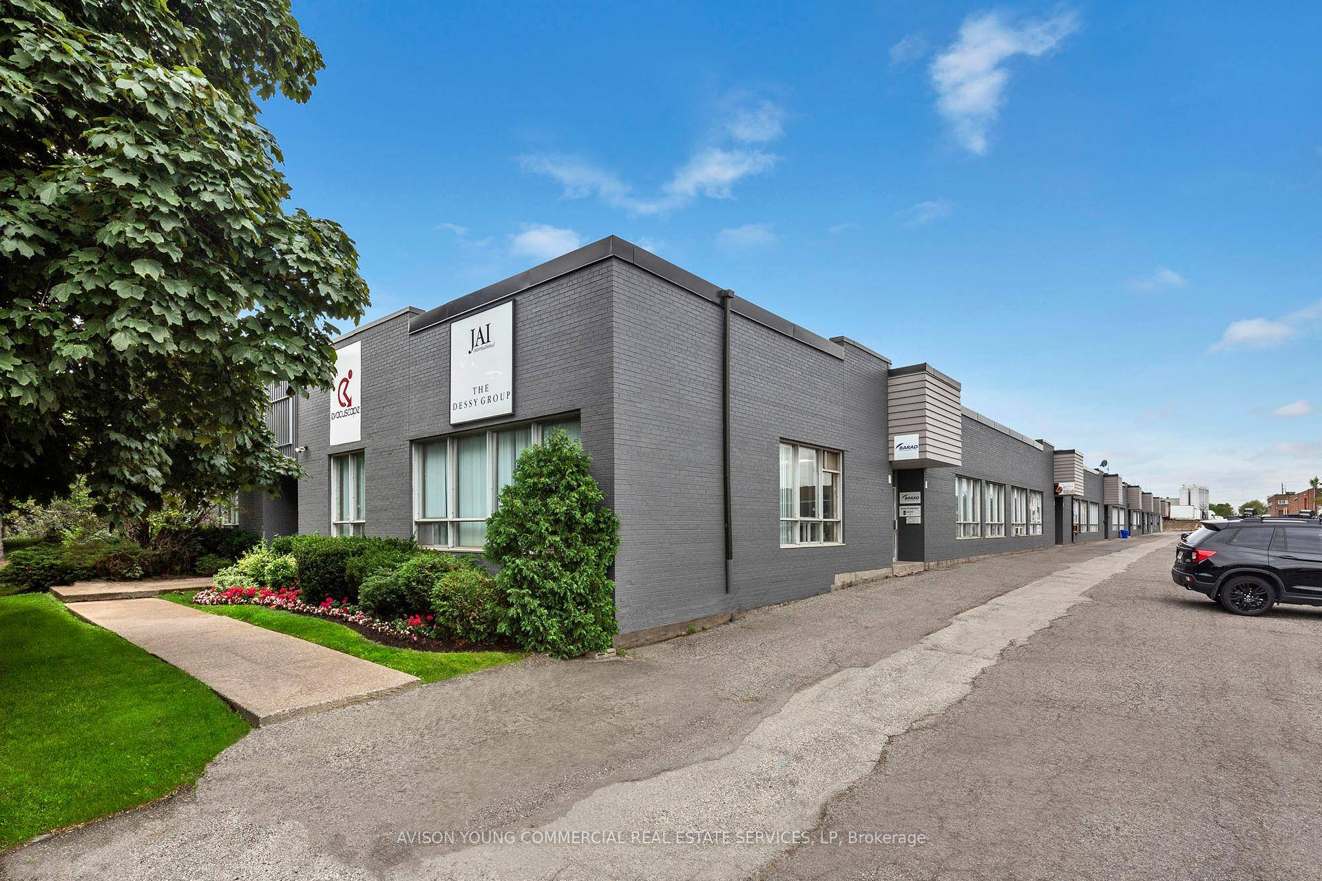 Clean corner industrial unit with truck level shipping.