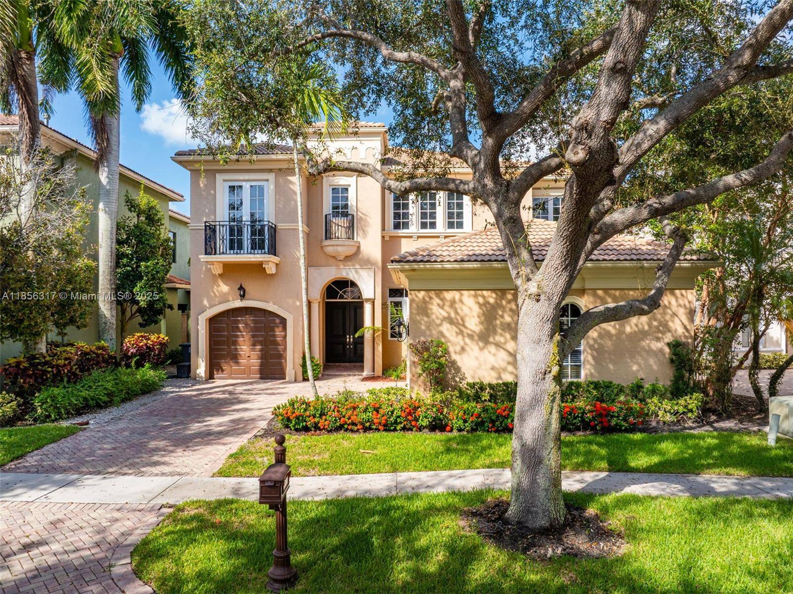 Welcome to 17771 Lake Azure Way in the prestigious Oaks at Boca Raton.