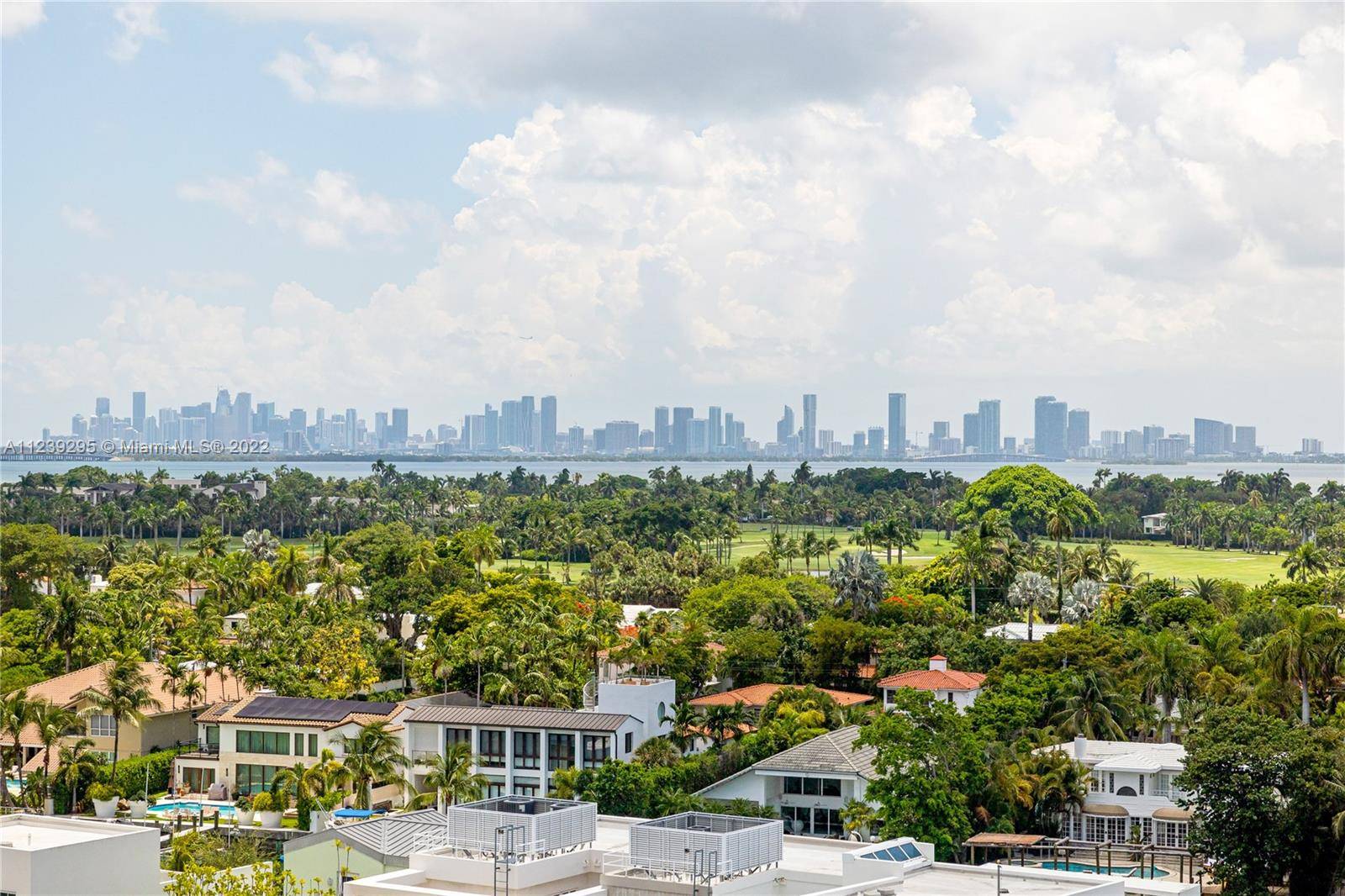 Situated within the lush Aqua community on Allison Island, this waterfront condo offers an elegant reprieve from the hustle and bustle of Miami Beach.