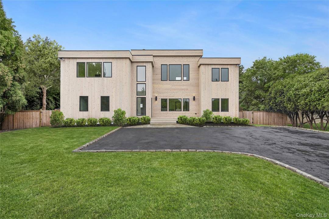Modern five bedroom, four bath residence offering approximately 2, 900 sq.