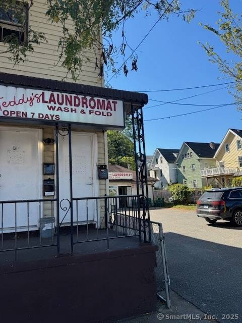 Spacious mixed use property featuring 4 residential units and 1 commercial unit totaling 3, 347 sq ft on a 0.