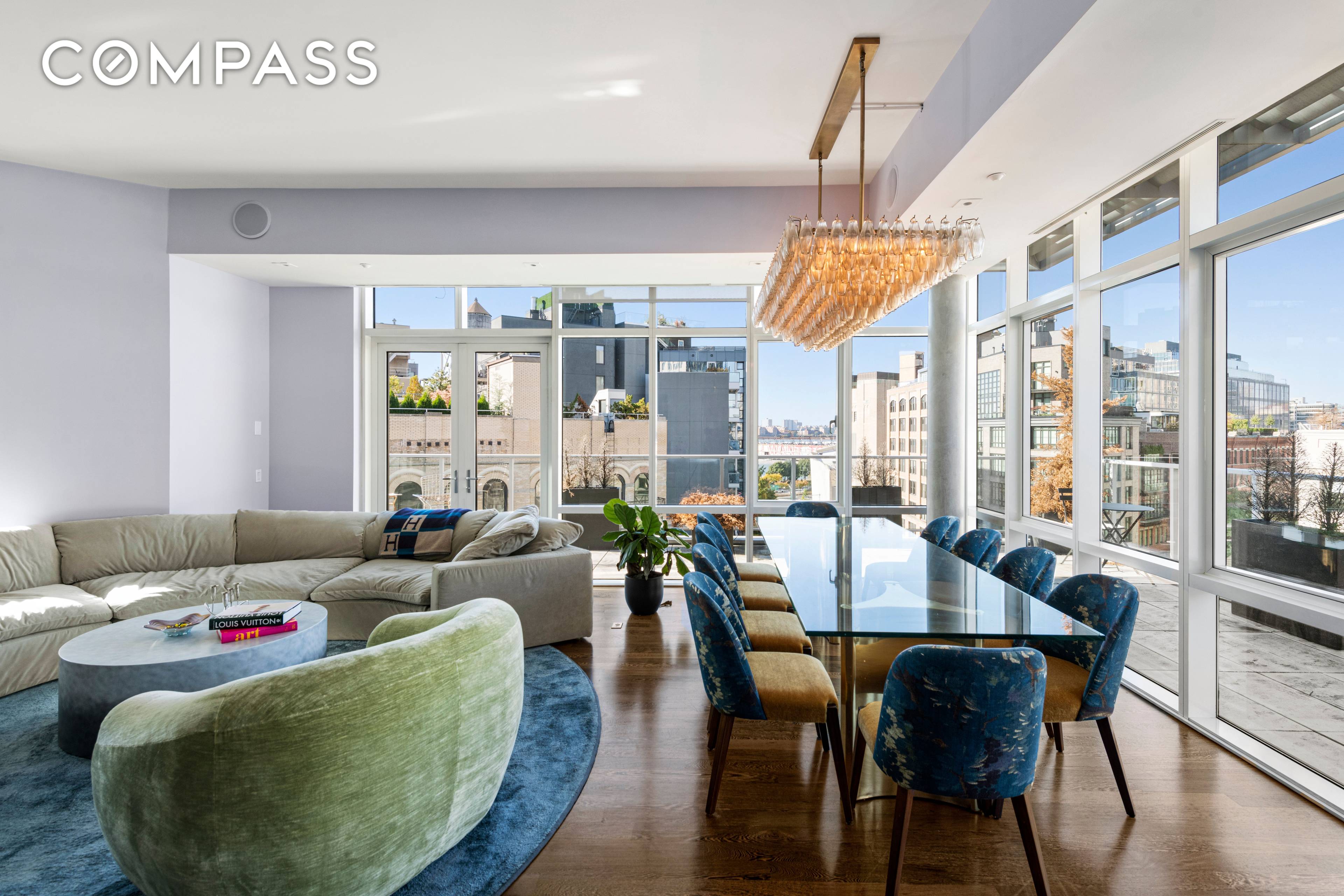 Stunning duplex penthouse residence, with a private 981sf roof deck, in addition to a 770sf wrap terrace on the main level, and a wood burning fireplace in a full service ...