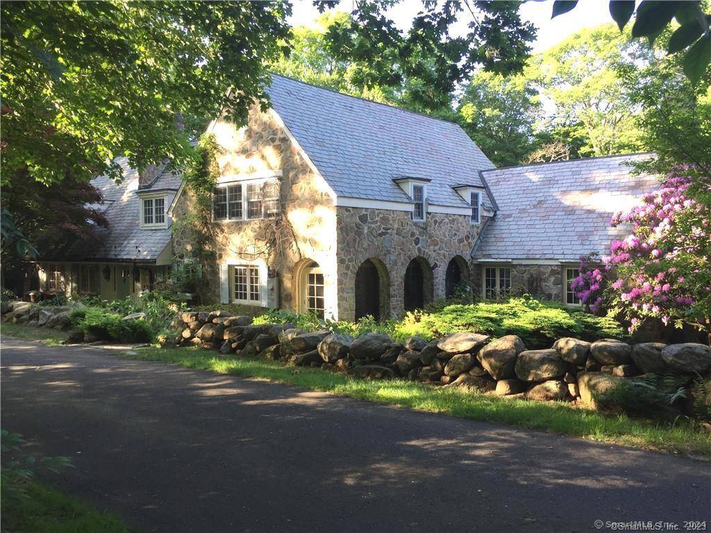 Very special Frasier Peters Stone home with all the charm of the English Countryside !