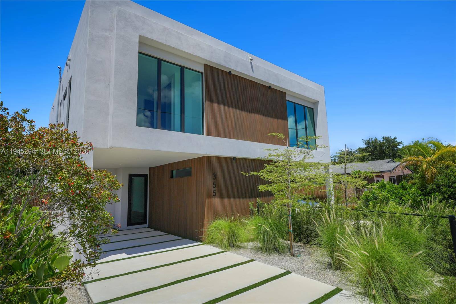 Be the first to live in this beautifully designed modern townhome with pool near The Miami Design District.
