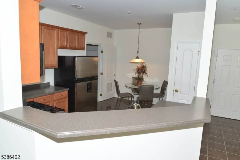 BEAUTIFUL, 2 bedroom, 2 full bath FIRST FLOOR condo in a desirable 55 community.
