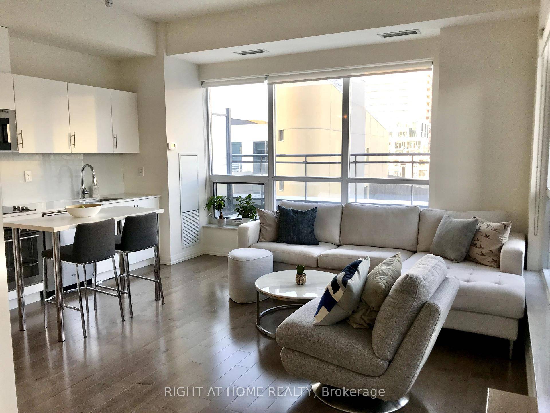 Stunning, sun filled corner unit with soaring 9 ft ceilings and an incredible 450 sq ft private terrace perfect for outdoor dining, entertaining, or relaxing in your own urban oasis ...