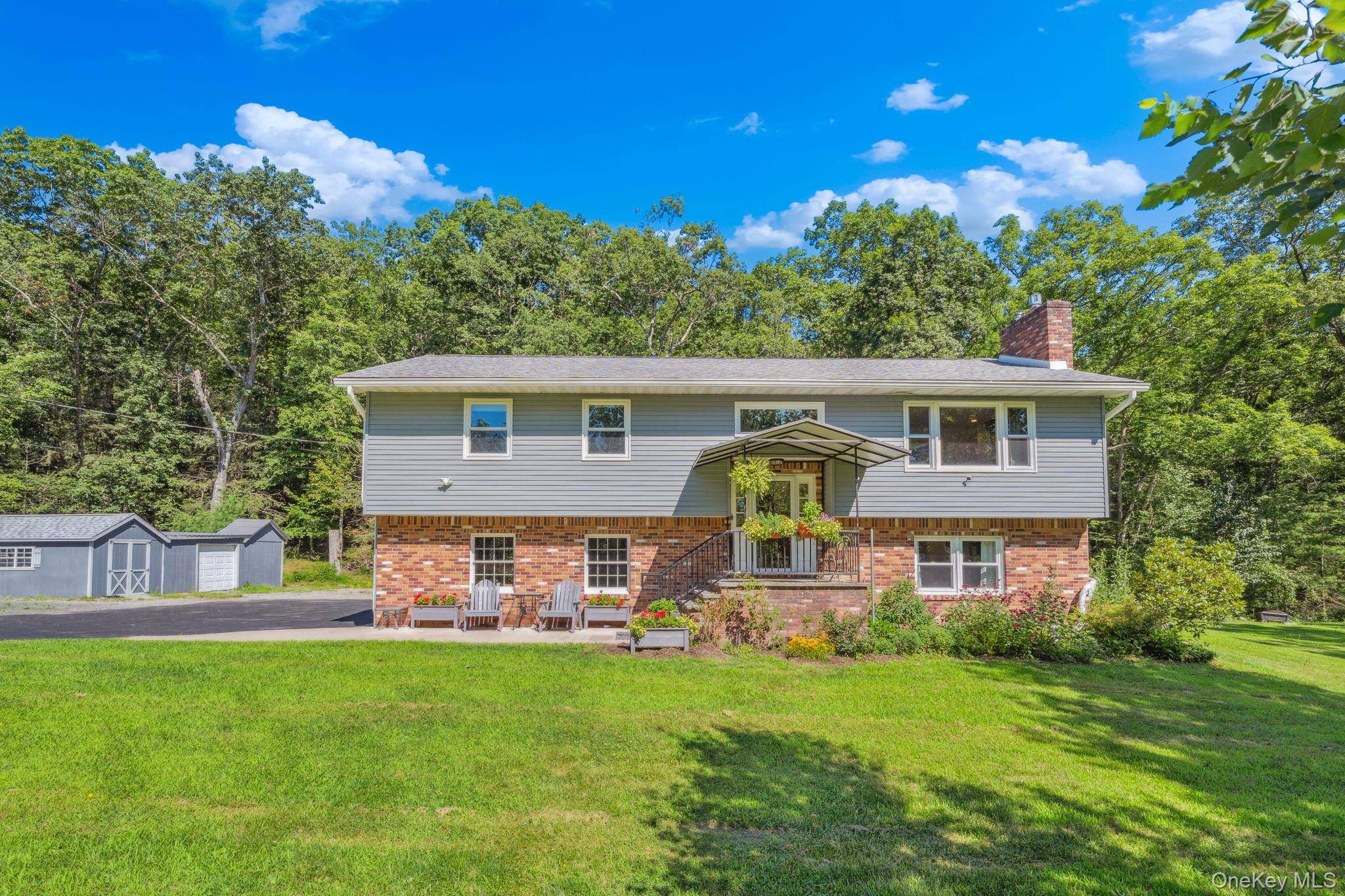 This lovely move in ready raised ranch is set on 1.