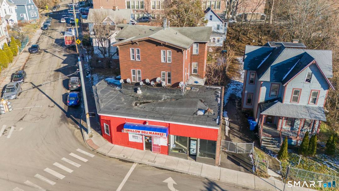 Prime corner mixed use building located at the intersection of Willow Pine St with 9 total units 6 2BR 1BA, 1 studio, 2 retail.