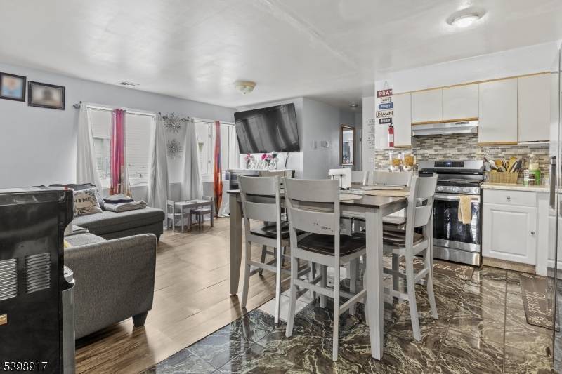 Stunning Multi Family conveniently located in a great neighborhood, nearby shops and Routes 20, 80 46.