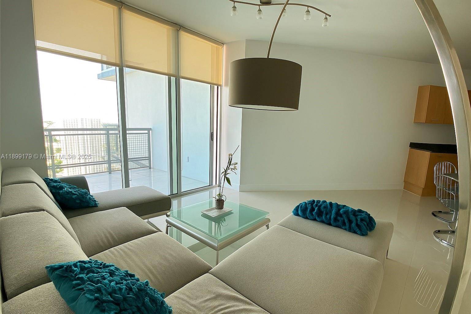 Spacious 1 bedroom, 1 bath residence on the 38th floor of the prestigious Wind Condominium in Brickell delivers panoramic, unobstructed views of the Miami skyline and the shimmering ocean beyond.