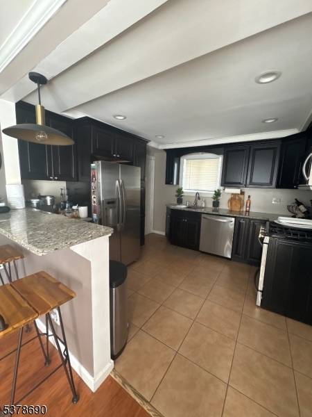 Move right in to this beautifully maintained gem featuring laminated floors, a modern granite kitchen with stainless steel appliances and a dedicated office perfect for remote work.