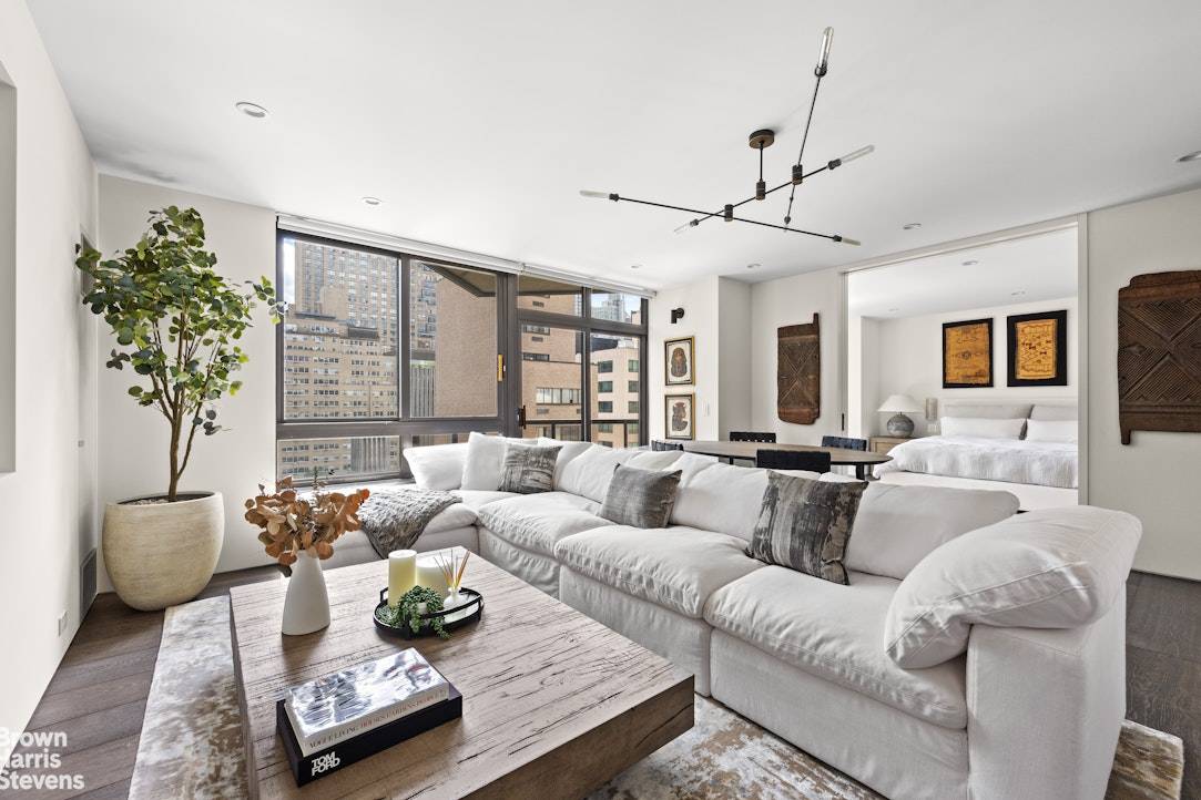 Residence 15D is a completely gut renovated, triple mint condition 1 bedroom, 1 bath at 100 United Nations Plaza, one of Midtown East's premier white glove condominium buildings.