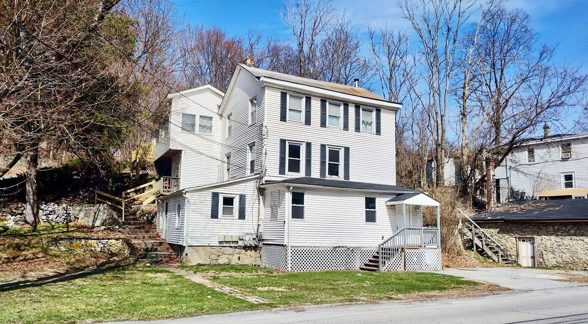 This beautifully renovated two unit apartment building is situated in the charming hamlet of New Hamburg, offering a prime investment opportunity in a highly desirable location.